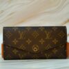 Louis Vuitton Sarah Wallet: Monogram Canvas & Pink Interior